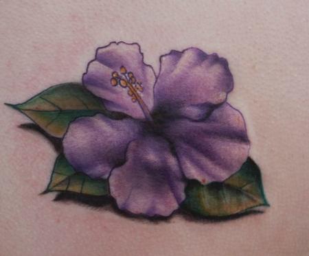 Ryan Mullins - Bright purple hibiscus flower tattoo